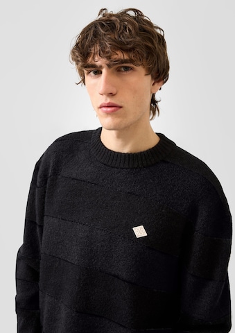 Pull-over QS en noir : devant