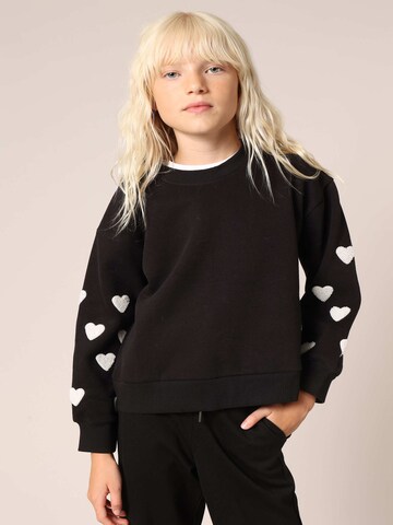 Pull-over 'SARINA' Deeluxe en noir : devant