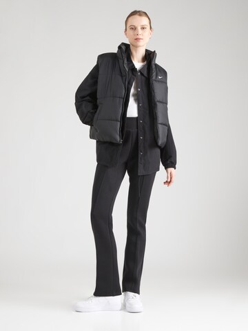 Nike Sportswear Bootcut Παντελόνι 'Tech Fleece' σε μαύρο