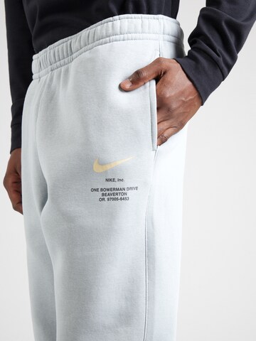 Nike Sportswear Tapered Hose in Blau