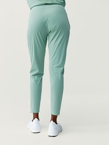 Born Living Yoga Skinny Sportbroek 'Airla' in Groen