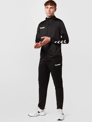 Hummel Tracksuit in Black: front