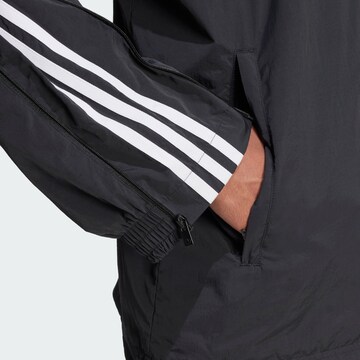 ADIDAS ORIGINALS Tussenjas 'Adilenium Season 3' in Zwart