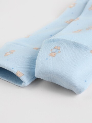 Pijamale de la Next pe albastru