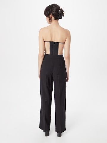 ABOUT YOU Loose fit Trousers with creases 'Marle' in Black