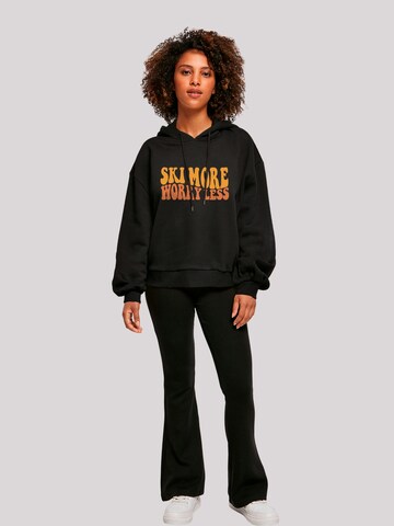 Sweat-shirt 'Ski More Worry Less' F4NT4STIC en noir
