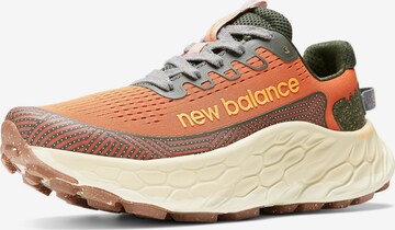 Chaussure de course 'Fresh Foam X More Trail V3' new balance en orange : devant