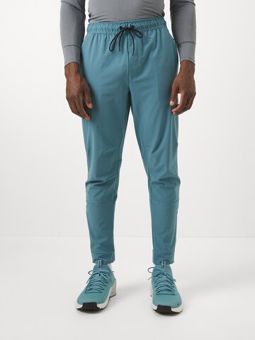 NIKEregular Sportske hlače 'UNLIMITED' - plava boja: prednji dio