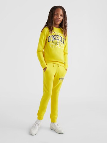 Tapered Pantaloni sportivi di O'NEILL in giallo