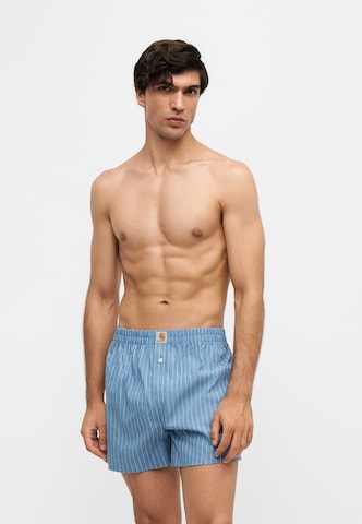 Carhartt WIP Boxerky – modrá: přední strana