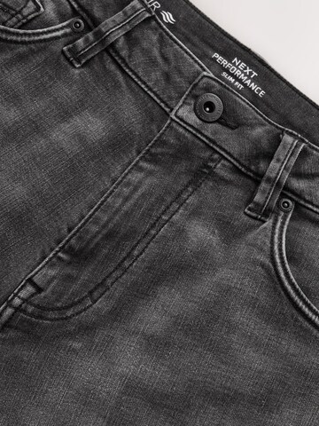 Next Slimfit Shorts 'Motion Flex' in Grau