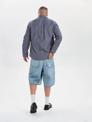 Dxnmxrk - Pierna ancha Vaquero 'DXHarri Blue Wide Fit Denim Shorts' en azul