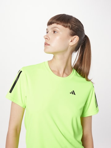 Maglia funzionale 'Own The Run' di ADIDAS PERFORMANCE in verde