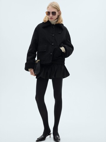 Veste mi-saison 'Eme' MANGO en noir