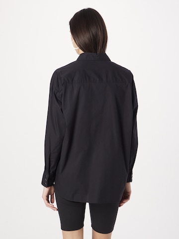 QS - Blusa em preto