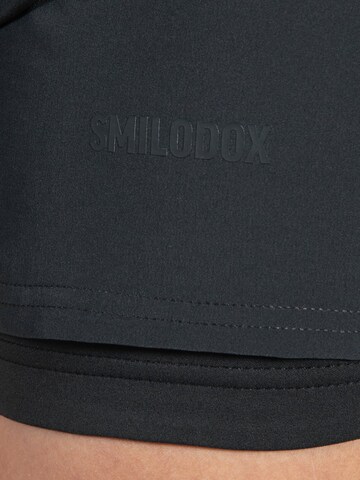 Smilodox Loosefit Sportbroek 'Advance Pro' in Zwart