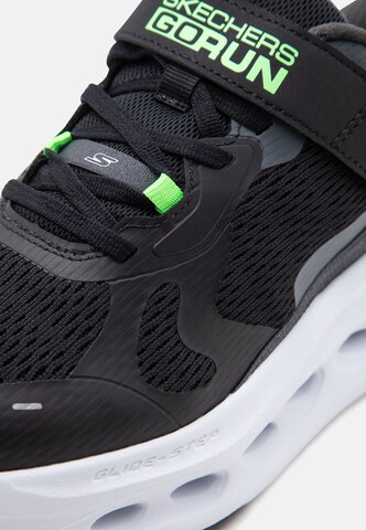 SKECHERS Tennarit 'MAX CUSHIONING GLIDE-STEP' värissä musta