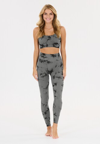 Athlecia Skinny Sportbroek 'Theresa' in Groen