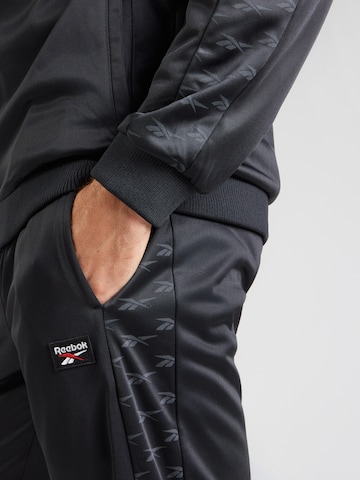 juoda Reebok Treniruočių kostiumas 'ZEN CUT AND SEW'