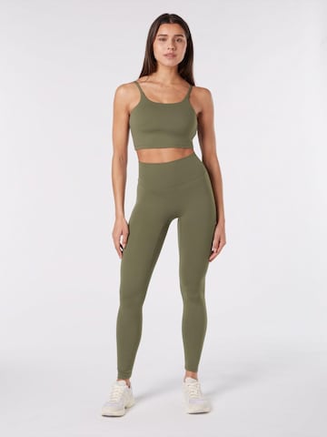 YO-GAYA Skinny Leggings in Green: front