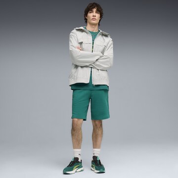 PUMA Regular Broek 'Aramco F1® Team Essentials' in Groen