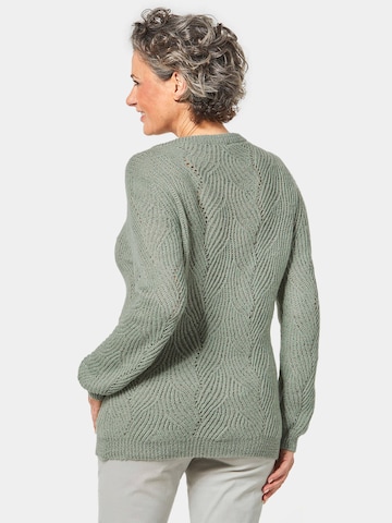 Goldner Pullover in Grün