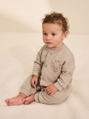 smALLSAINTS Sparkdräkt/body i beige: framsida