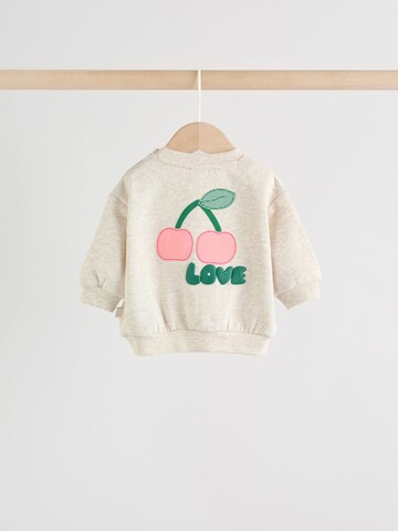 Next Sada – šedá