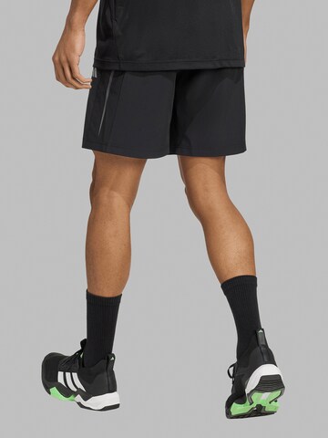 ADIDAS PERFORMANCE Loosefit Urheiluhousut 'Tech Apparel' värissä musta