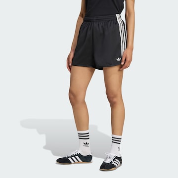 Largi Pantaloni de la ADIDAS ORIGINALS pe negru: față
