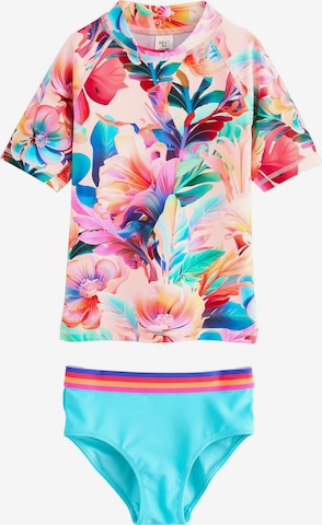 Next UV-suoja värissä vaaleanpunainen: etupuoli