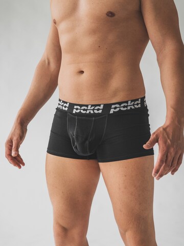 pckd – underwear done right. Boxer shorts in Black: front