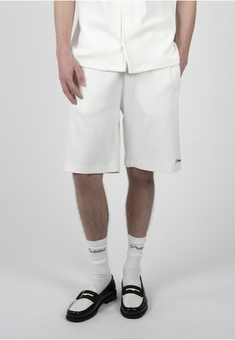 Prohibited Regular Trousers in White: front