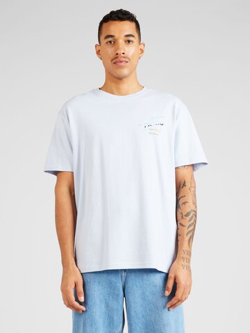 Tricou de la Tommy Jeans pe albastru: față