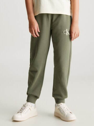 Calvin Klein Jeans Zwężany krój Spodnie w kolorze zielony: przód