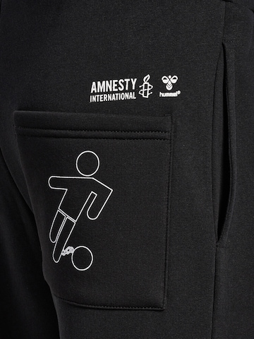 Regular Pantalon de sport 'Amnesty' Hummel en noir