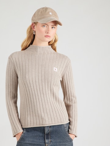 Pull-over Calvin Klein Jeans en beige : devant