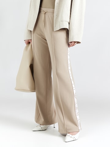 EA7 Emporio Armani Zvonové kalhoty Kalhoty – šedá: přední strana