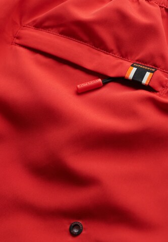 Shorts de bain Superdry en rouge