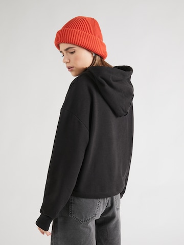 Tommy Jeans Sweatshirt 'Essential' i svart