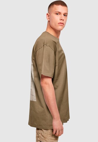 Merchcode T-Shirt 'Missing Peace' in Grün