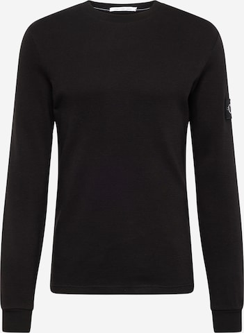 T-Shirt Calvin Klein Jeans en noir : devant