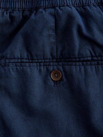 Slimfit Pantaloni chino di Next in blu