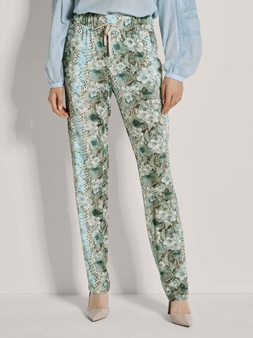 MADELEINE Tapered Trousers in Green: front