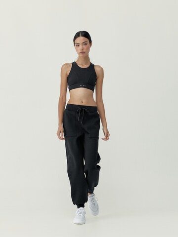 Born Regular Sports trousers ' Bloom ' in Black