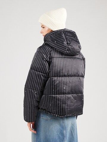 Tommy Jeans Jacke 'STARDUST' in Schwarz