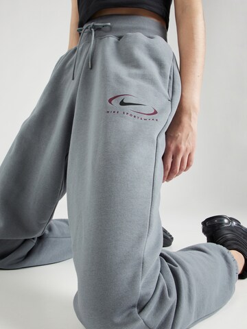Nike Sportswear Ozke Hlače 'PHOENIX FLEECE' | siva barva