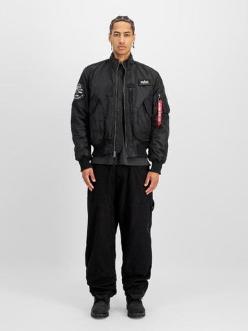 ALPHA INDUSTRIES Between-Season Jacket 'Engine' in Black: front