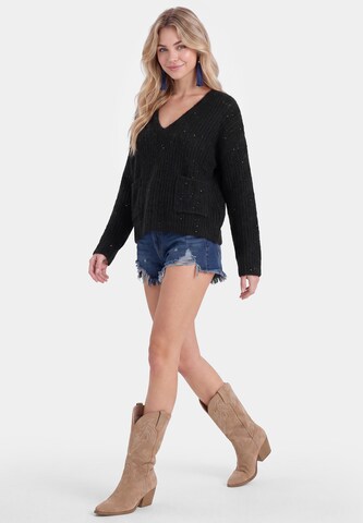 IZIA - Jersey en negro: frente