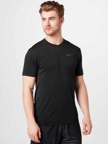 T-Shirt fonctionnel NIKE en noir : devant